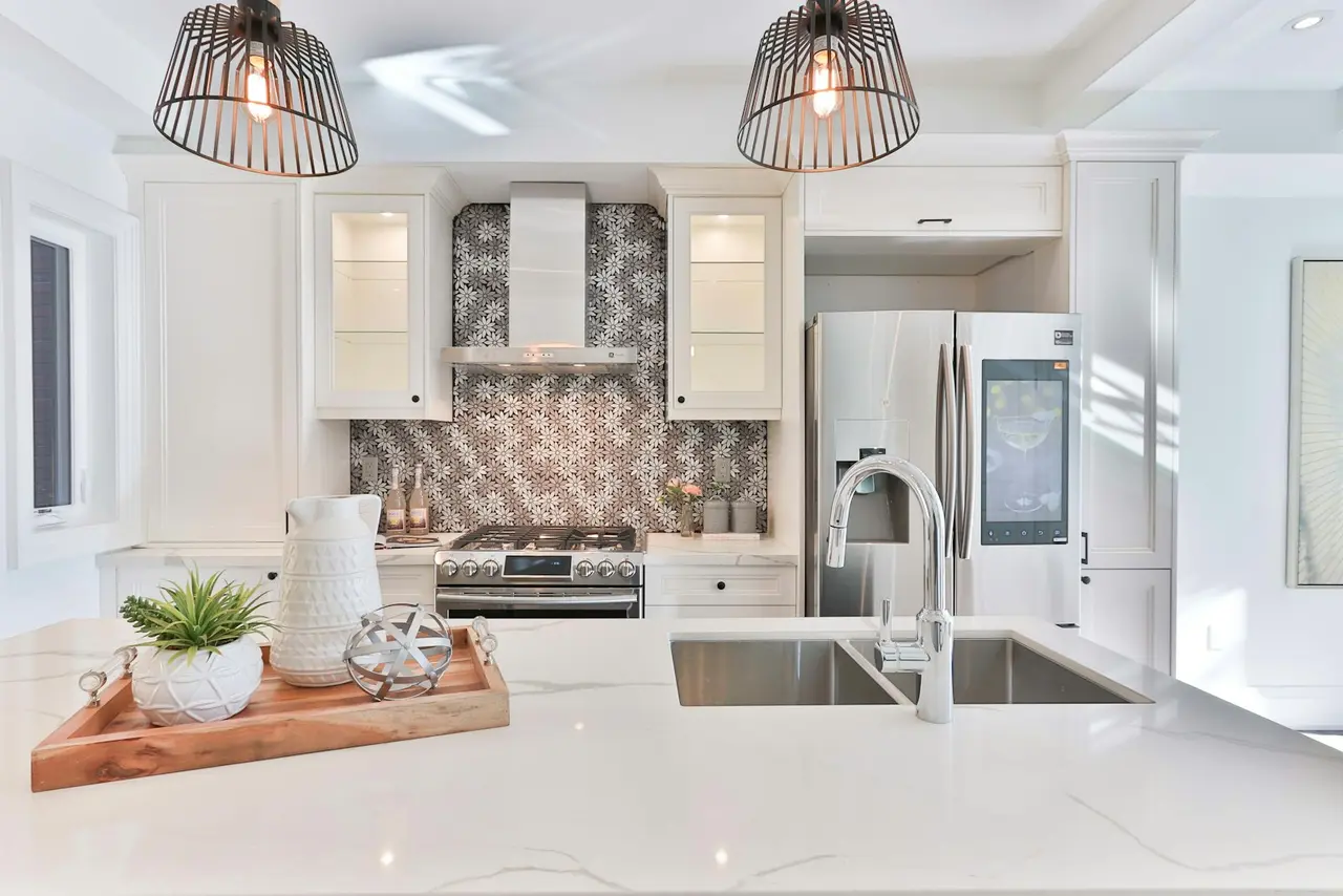Polished stone kitchen countertop in a bright interior